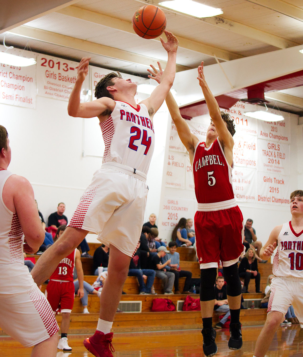 Blane Whatley (24) goes for a rebound.